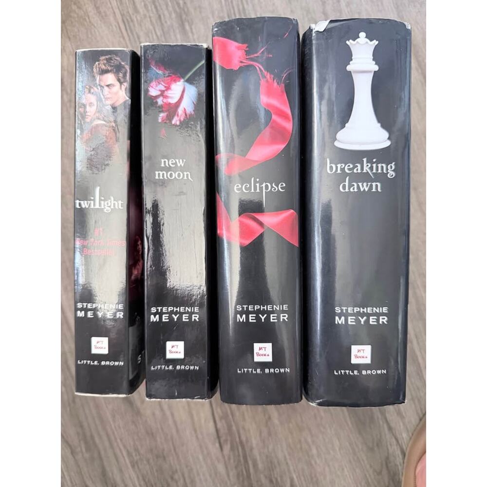 Twilight series 2 hard cover and 2 paper backs.